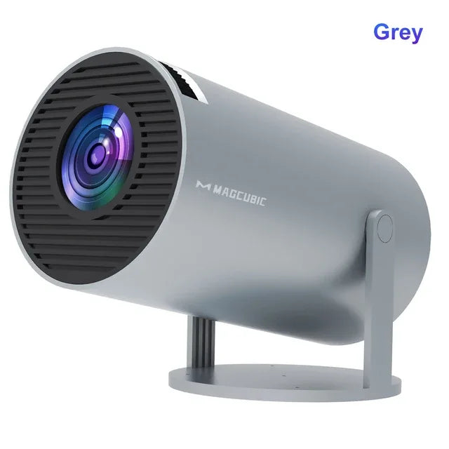 Grey MAGCUBIC portable projector with adjustable stand and lens, modern tech gadget
